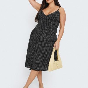 Cabernet Asymmetrical Set Black Polka Curve